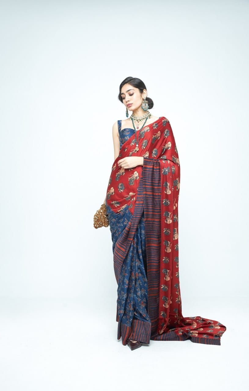 Elegant Eden saree by Anushe Pirani featuring intricate embroidery and vibrant fabric, displayed in a front view.