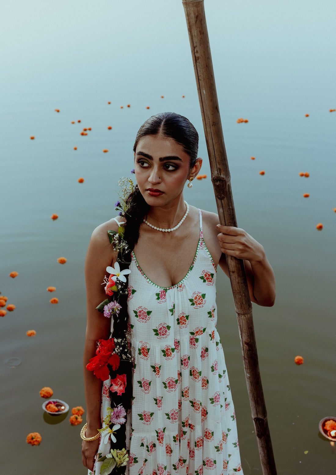 Marigold Begum Dress by The Raw India featuring intricate embroidery and flowing fabric, perfect for elegant occasions.