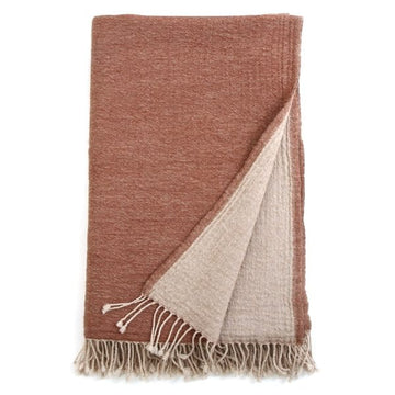 Cream wool blanket from Bombaybirds Camel N Cream collection, soft and cozy living room throw on a neutral background.