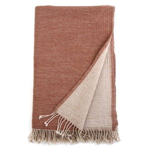 Cream wool blanket from Bombaybirds Camel N Cream collection, soft and cozy living room throw on a neutral background.