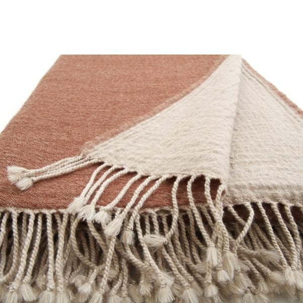 Cream wool blanket from Bombaybirds Camel N Cream collection, soft and cozy living room throw on a neutral background.