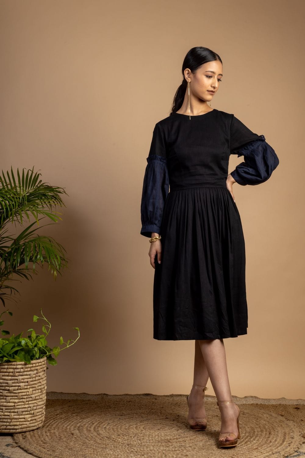 Sophia black dress by Doodlage featuring a stylish, fitted design with elegant fabric and a classic silhouette.