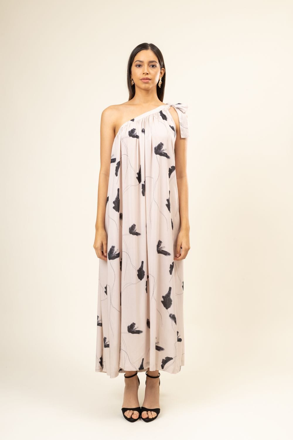 Doodlage Daryl printed dress with vibrant floral pattern, short sleeves, and knee-length design on a model.