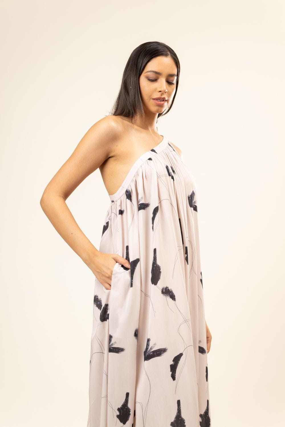 Doodlage Daryl printed dress with vibrant floral pattern, short sleeves, and knee-length design on model.