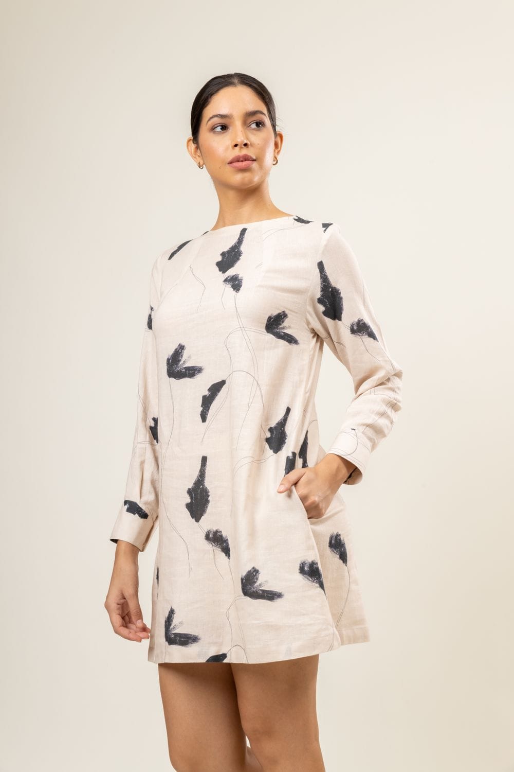 Doodlage Carrie printed dress with colorful floral pattern, knee-length, lightweight fabric, and round neckline.