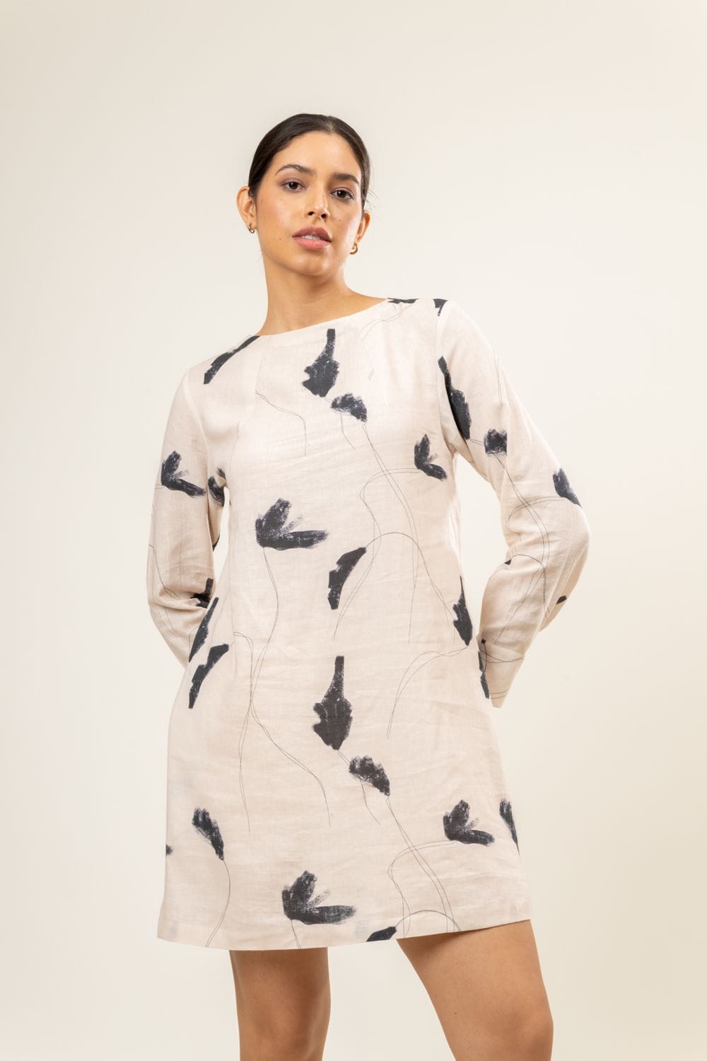 Doodlage Carrie printed dress with colorful floral pattern, fitted waist, and flowing fabric, perfect for casual or semi-formal wear.