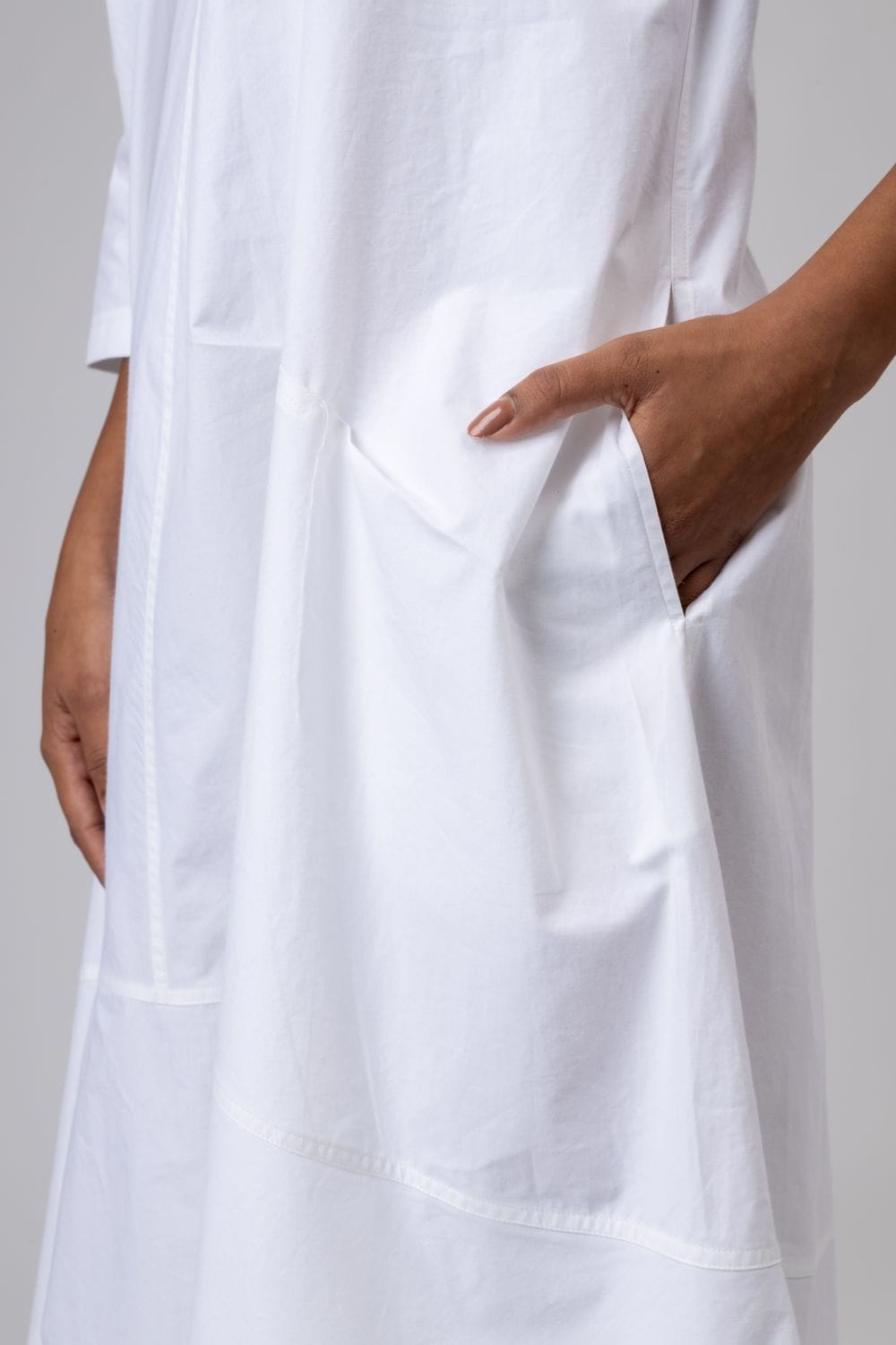 White Jill dress by Doodlage, stylish sleeveless dress with a flowy silhouette and subtle detailing, perfect for casual wear.