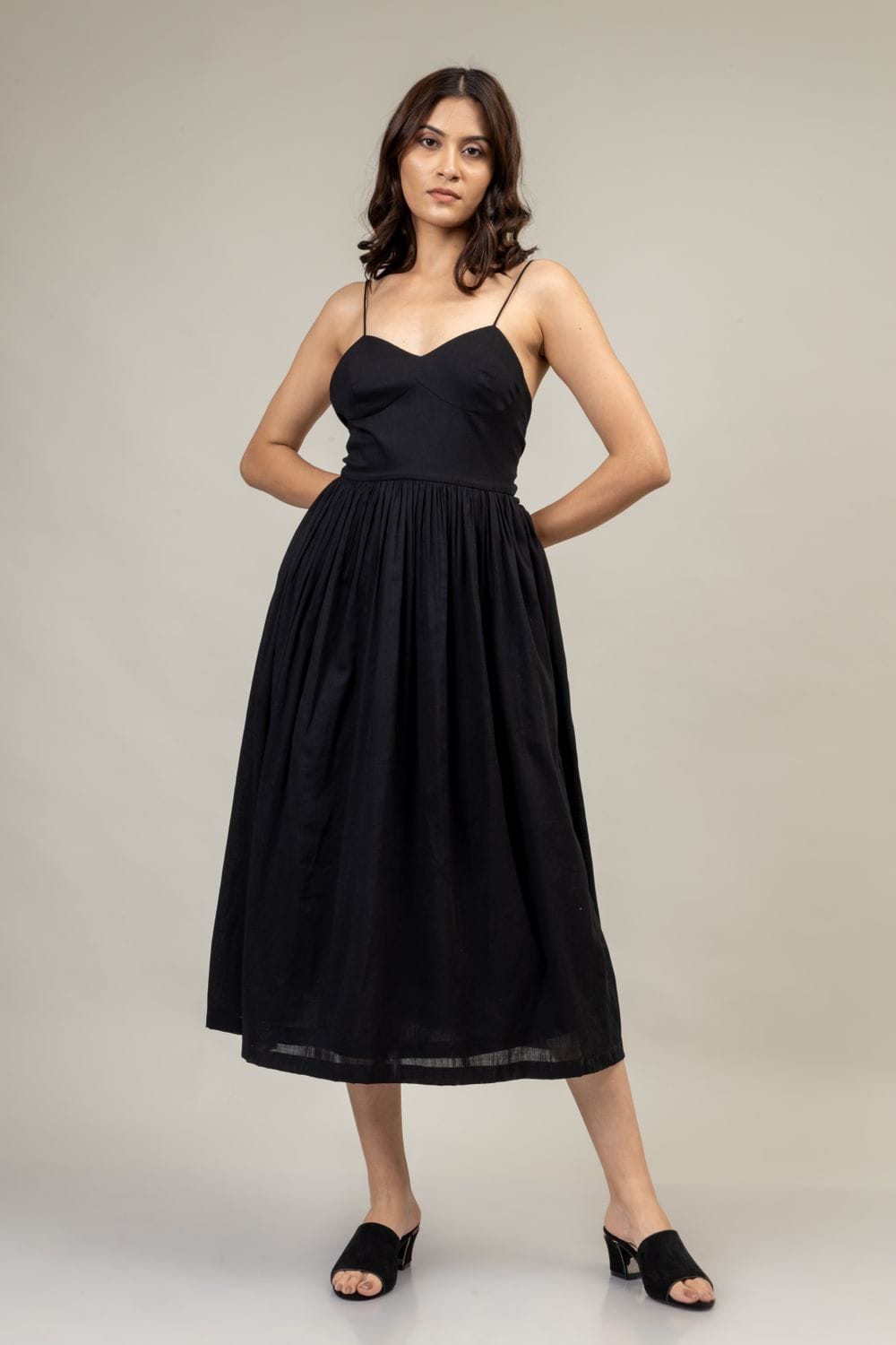 Doodlage Mary black dress, stylish sleeveless dress with a fitted silhouette and subtle detailing, perfect for casual or semi-formal wear.