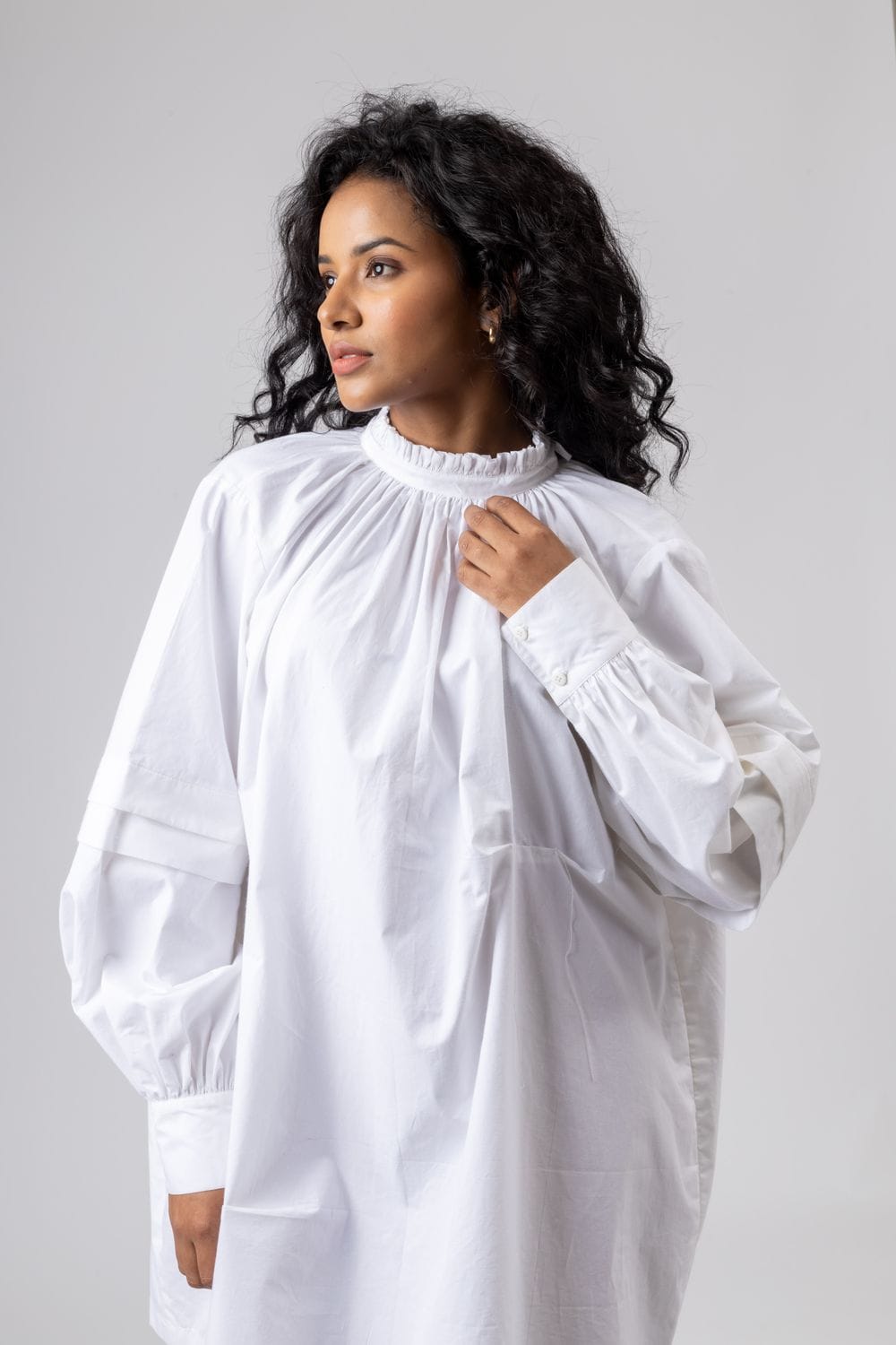 Alice white dress by Doodlage, stylish sleeveless dress with a flowing fabric and elegant design, perfect for casual or semi-formal wear.