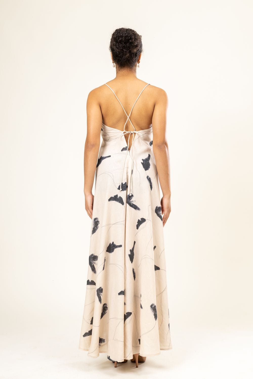Doodlage Lola printed dress with colorful floral pattern, sleeveless design, and knee-length silhouette.