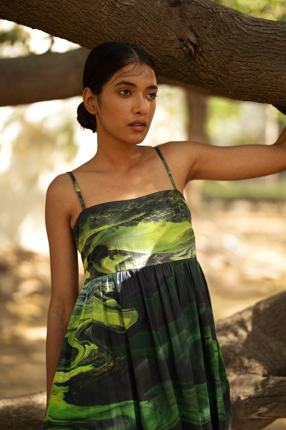 Doodlage Ella green dress from DRESSES & TUNICS collection, featuring a flowy fabric and stylish design.