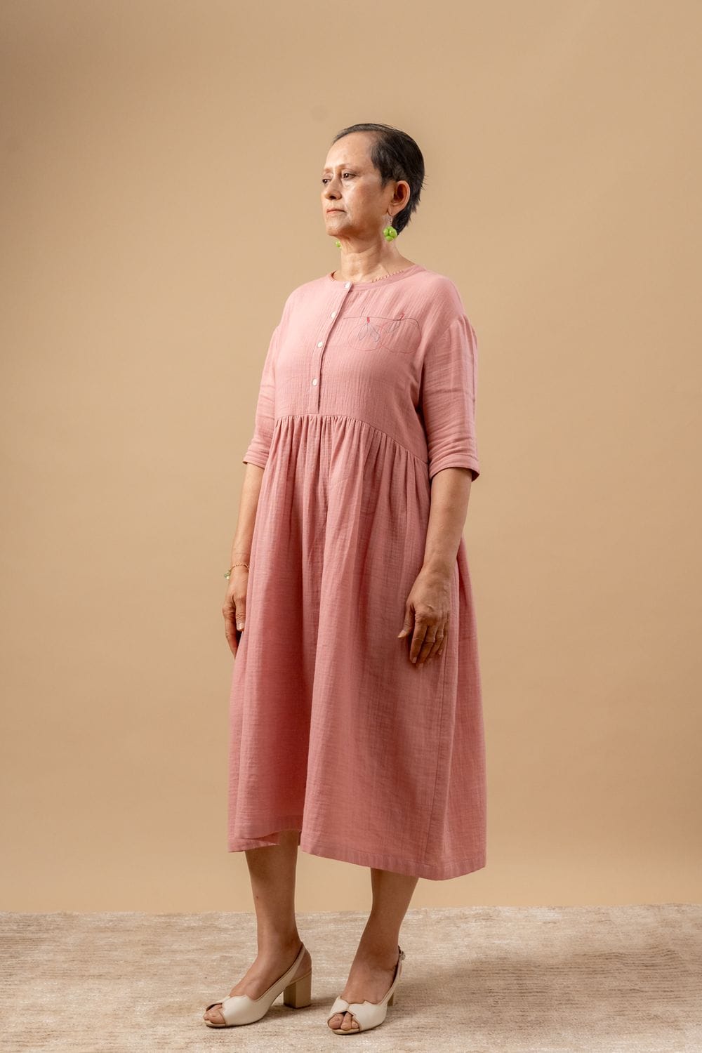 Doodlage Kara rose dress with floral pattern, knee-length design, lightweight fabric, and stylish silhouette.
