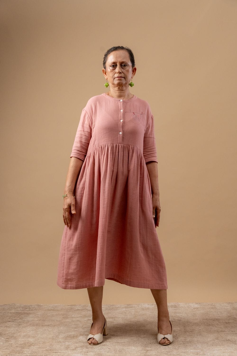 Doodlage Kara rose dress, lightweight fabric with floral rose pattern, short sleeves, and relaxed fit, perfect for casual wear.