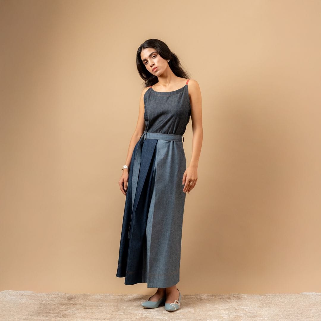 Doodlage Louisa upcycled denim dress with a fitted bodice and flared skirt, styled with long sleeves and a casual, eco-friendly design.