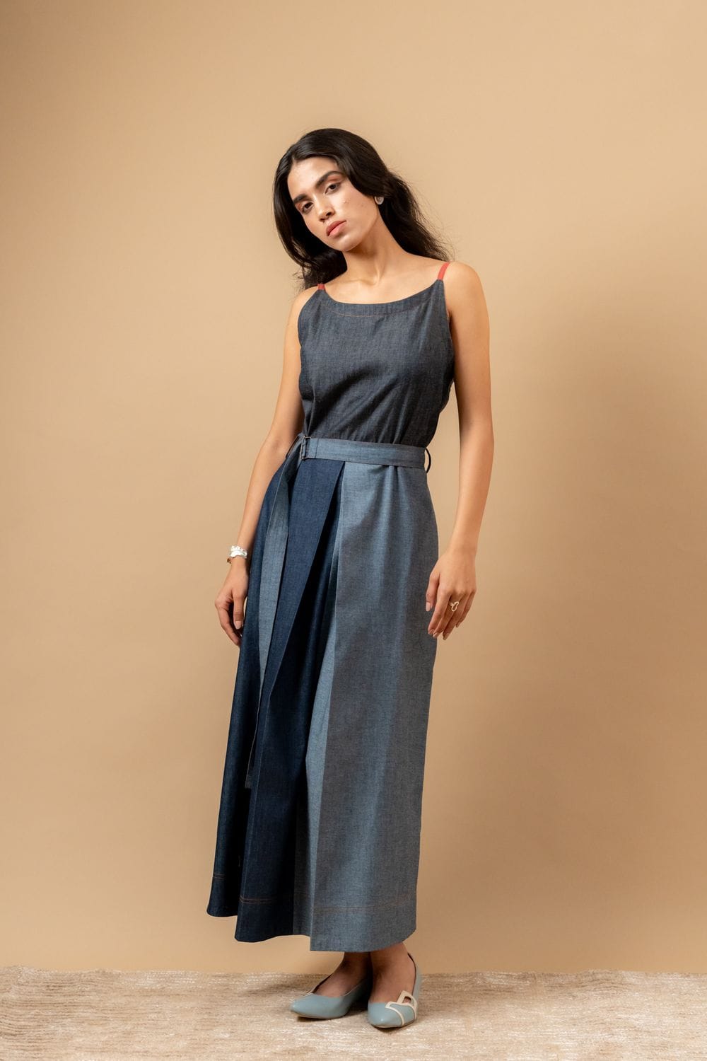 Doodlage Louisa upcycled denim dress with a fitted bodice and flared skirt, styled with long sleeves and a casual, eco-friendly design.