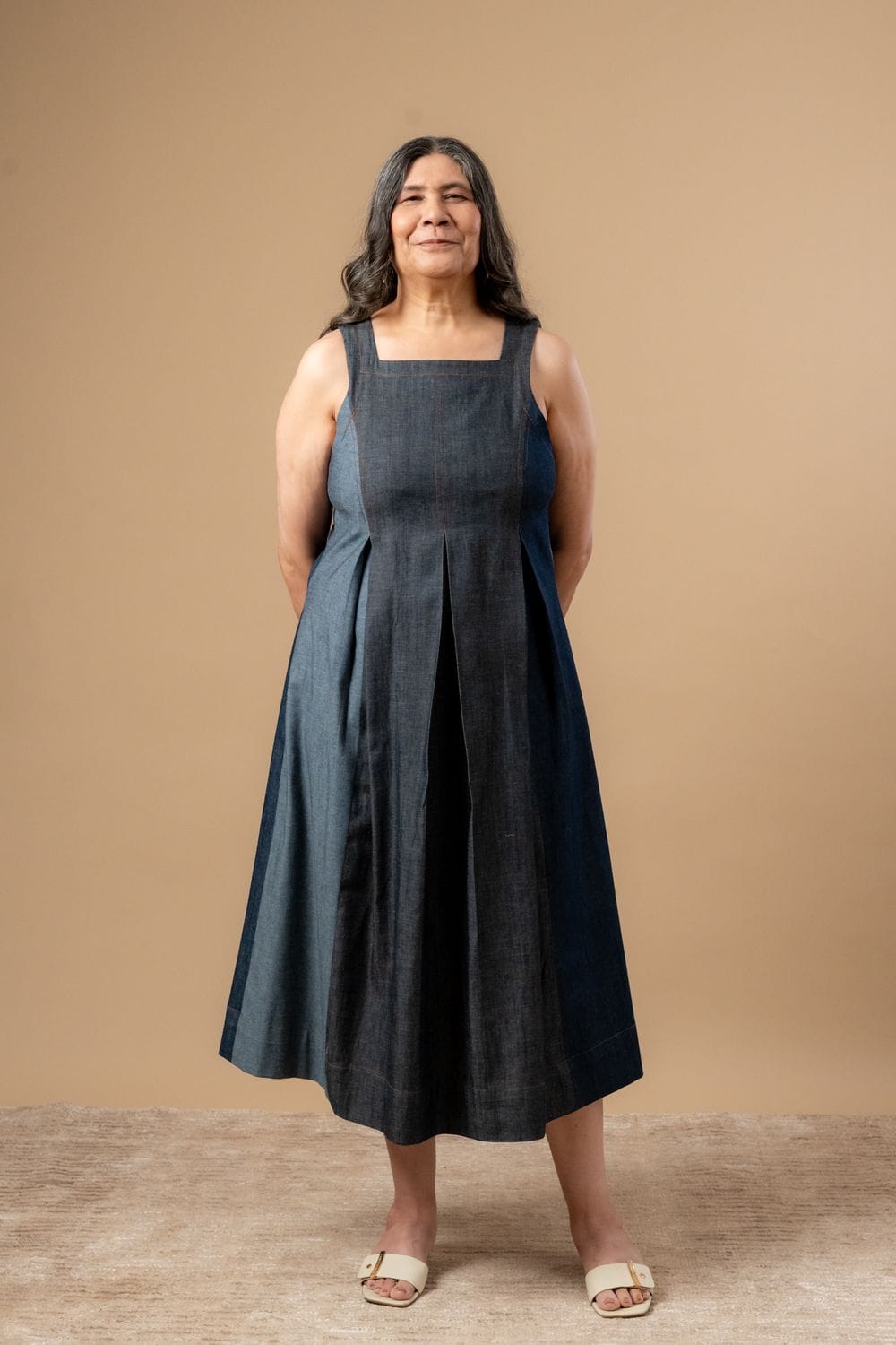 Doodlage Natalie denim dress featuring a stylish, casual design with a fitted silhouette and button details.