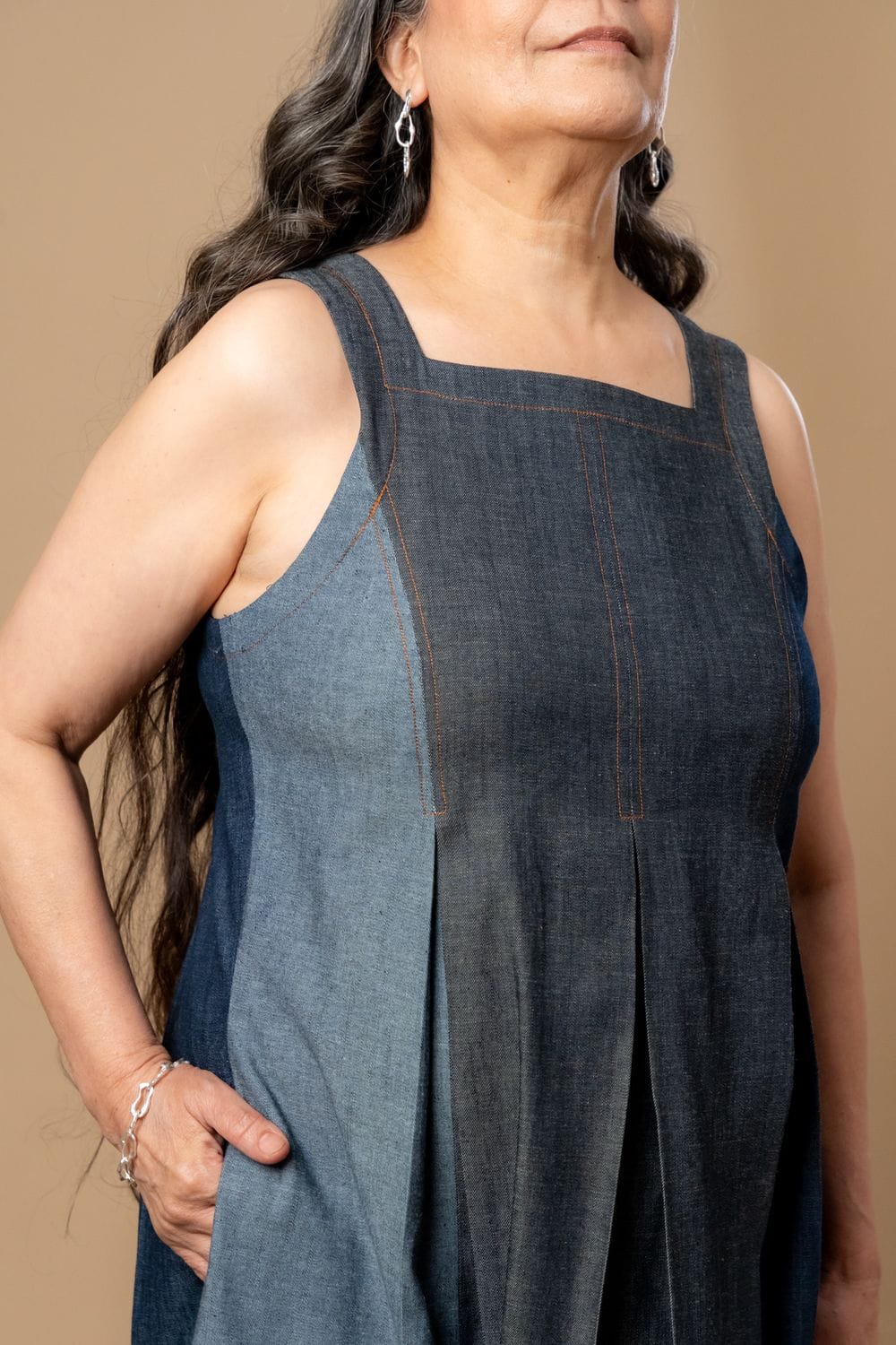 Doodlage Natalie denim dress with long sleeves and casual fit, featuring front button closure and patch pockets.
