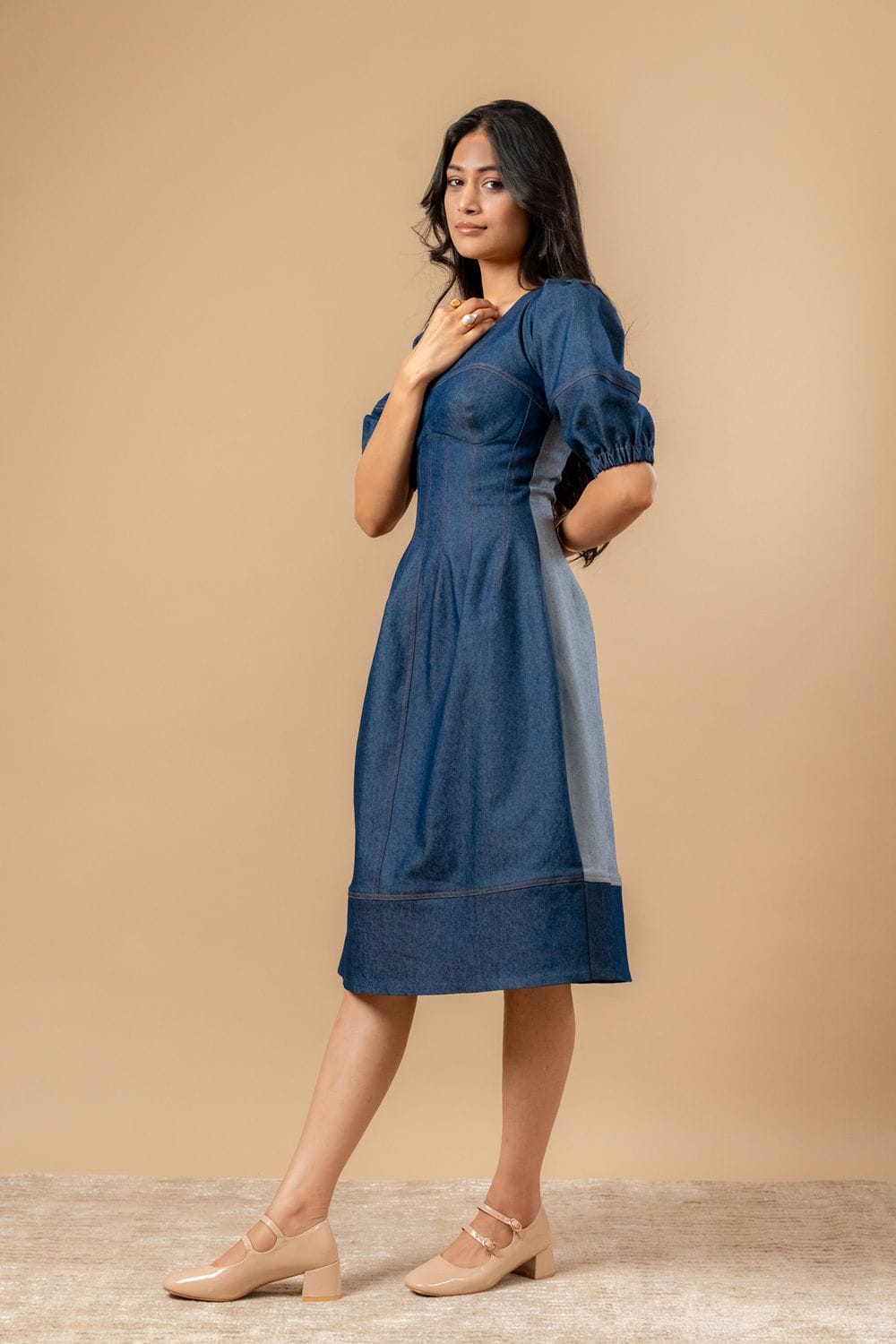 Doodlage Isabelle upcycled denim dress showing a casual fit with long sleeves and a front button closure.