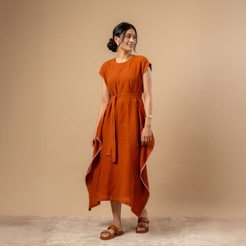 Doodlage Bessie knot dress in soft fabric with a stylish knot detail, shown on a hanger against a plain background.