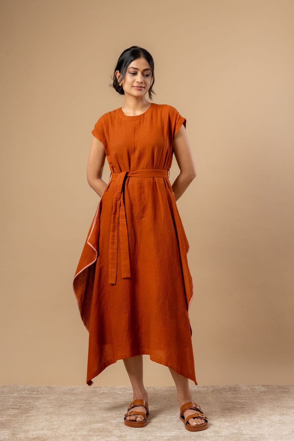Doodlage Bessie knot dress in vibrant fabric, featuring a stylish knot design and comfortable fit, displayed on a hanger.
