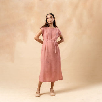 Doodlage Erna organic cotton dress with waist belt, showcasing a flowy, natural-fiber dress with a tied waist detail.