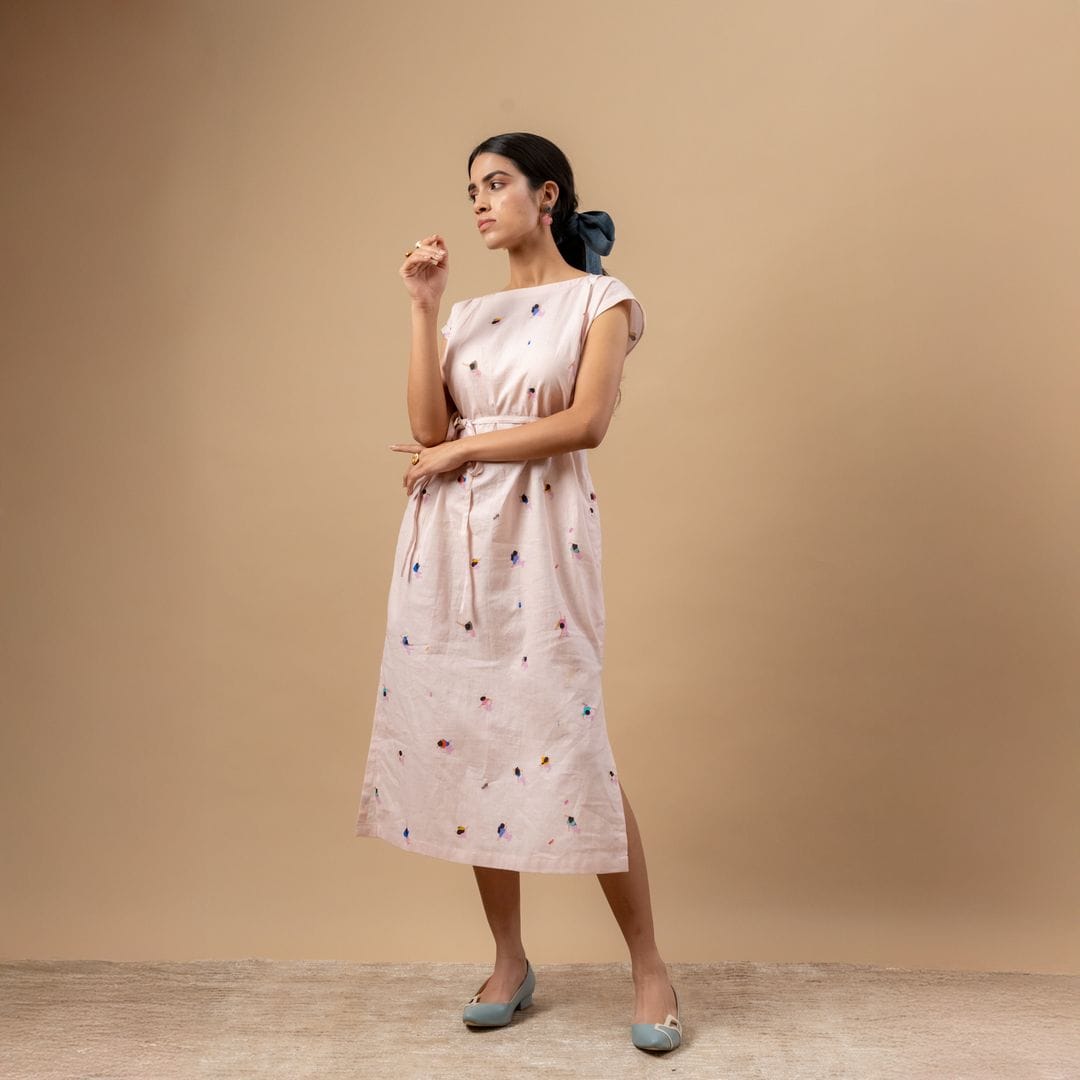 Doodlage Erna printed dress with floral pattern, short sleeves, and knee-length design on model showing front view.