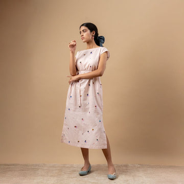 Doodlage Erna printed dress with floral pattern, short sleeves, and knee-length design on model showing front view.