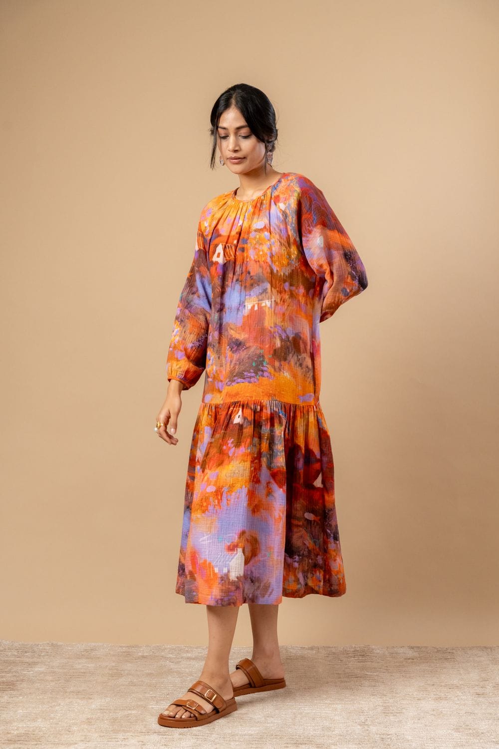 Doodlage Twig drop waist dress in earthy tone with short sleeves and relaxed fit, hanging on a wooden hanger.
