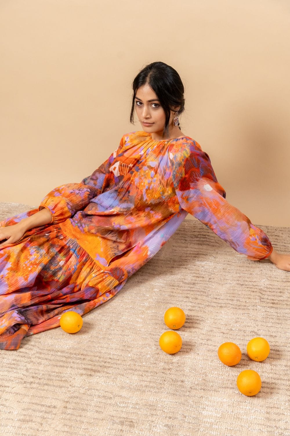Doodlage Twig drop waist dress in lightweight fabric with a relaxed fit and subtle pattern, displayed on a hanger.