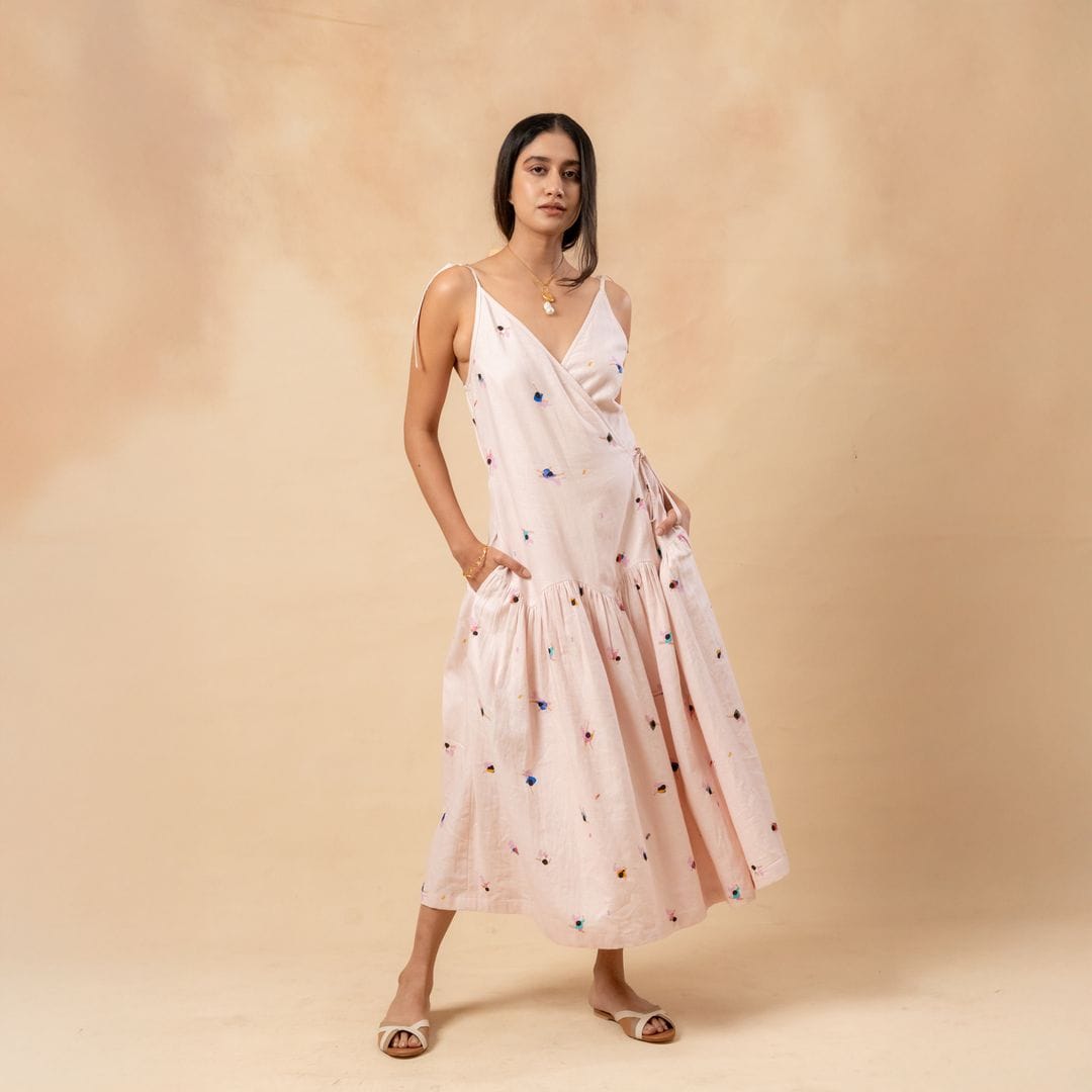 Doodlage crayon wrap dress in vibrant multicolor fabric, featuring a flattering fit and knee-length design.