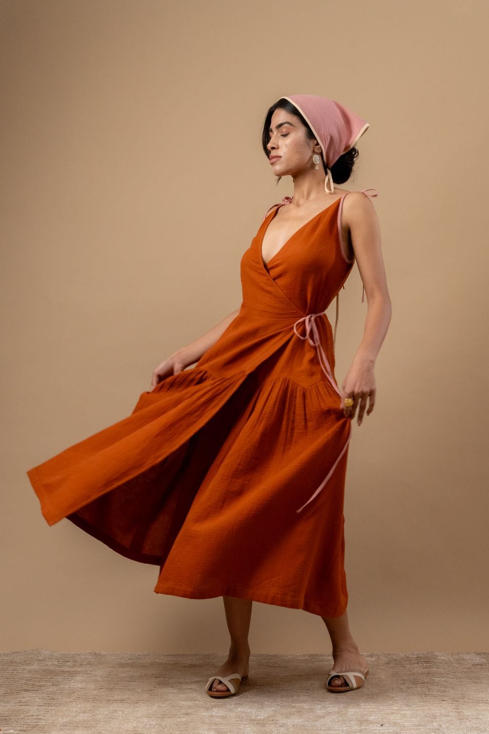 Doodlage Mudpie Maker dress, stylish sleeveless dress with floral pattern and ruffled details, perfect for casual wear.