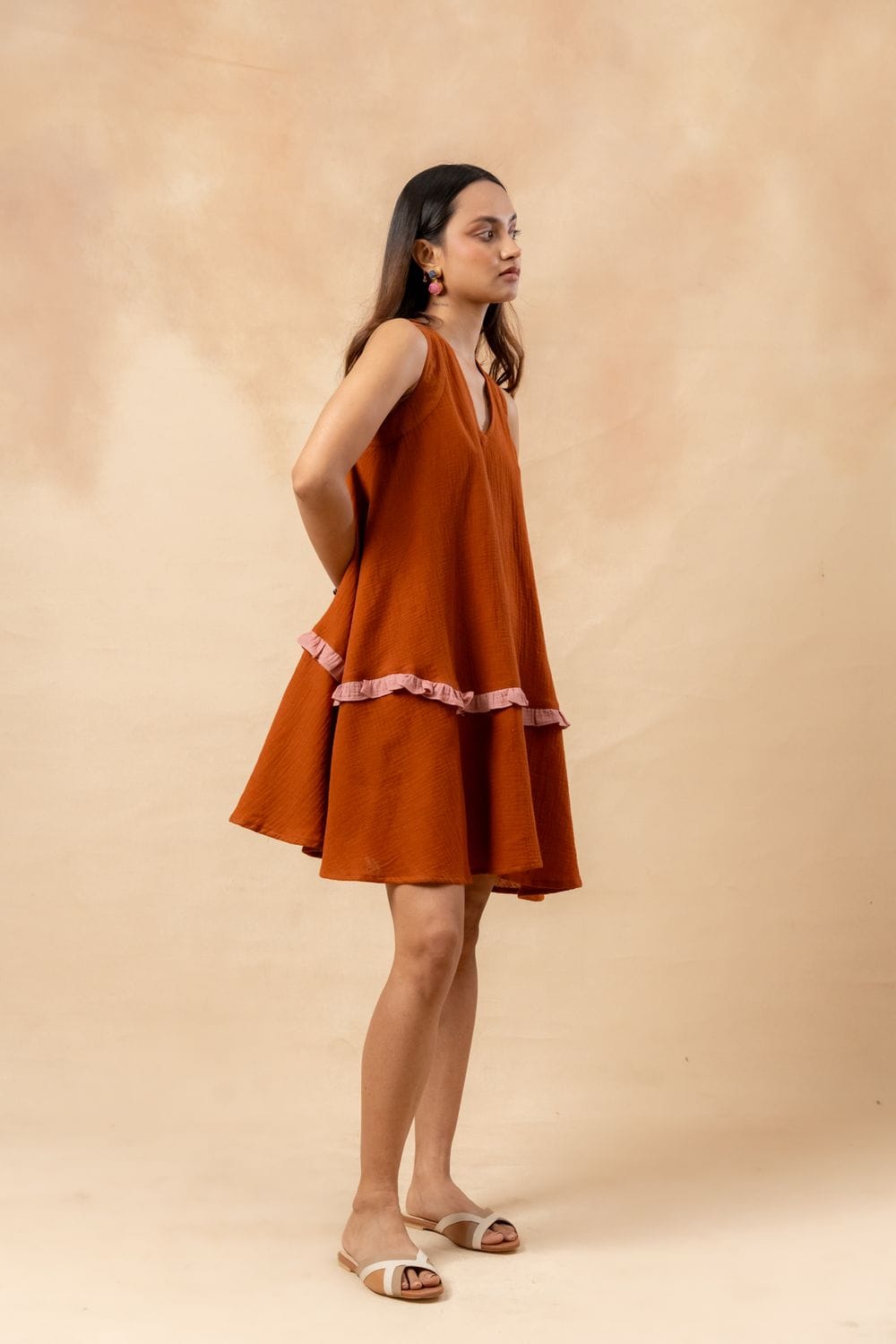 Doodlage Daisy Daze Dress showing lightweight fabric, floral pattern, and relaxed fit on a hanger.