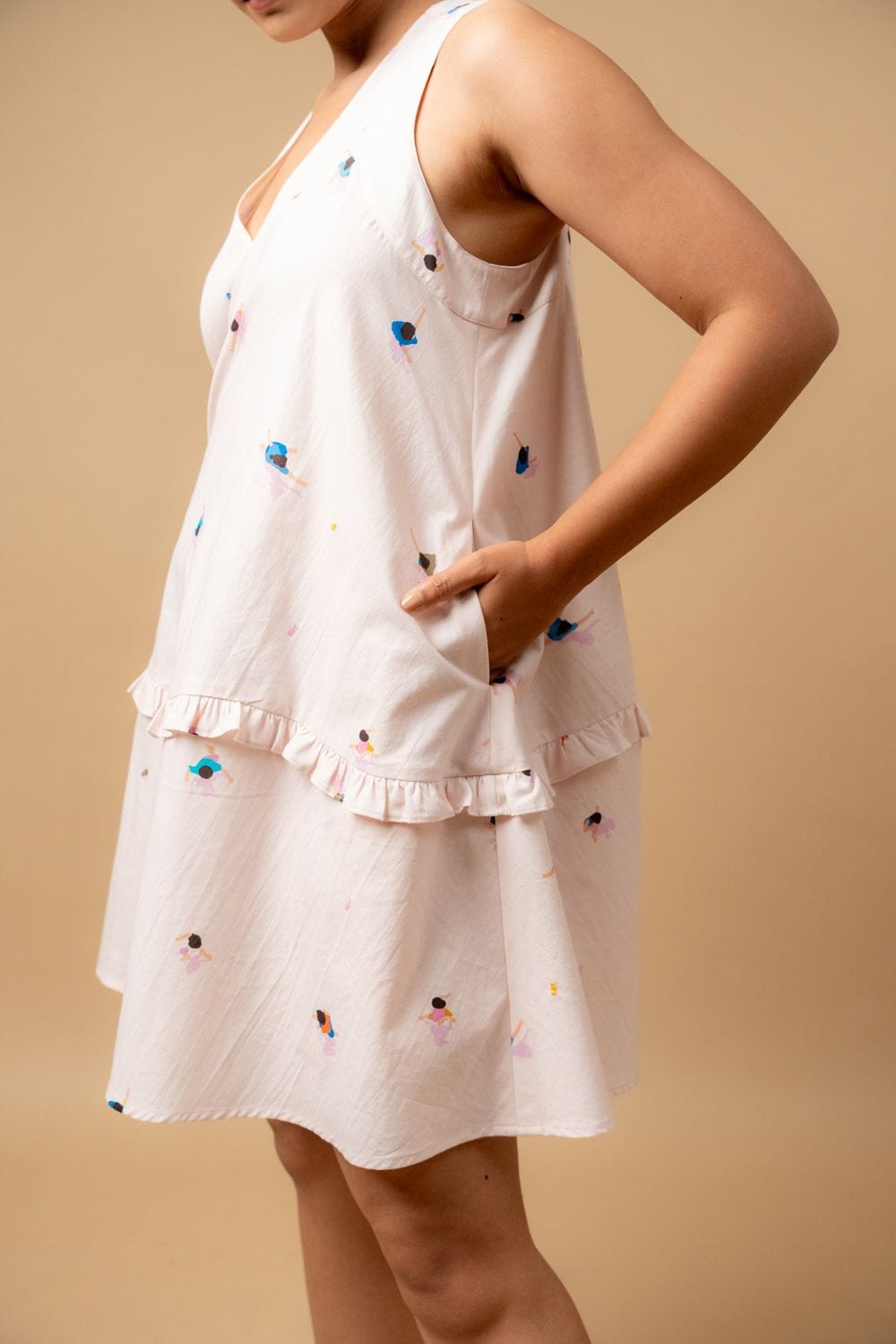 Doodlage Daisy Daze printed dress with floral pattern, sleeveless design, and lightweight fabric, displayed on a hanger.