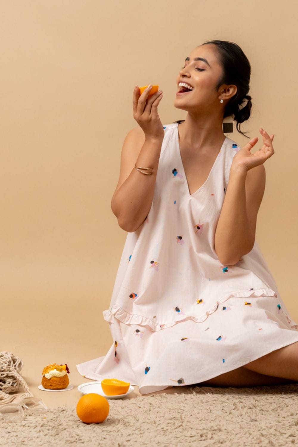 Doodlage Daisy Daze printed dress with floral pattern, short sleeves, and flowy fabric on a model.