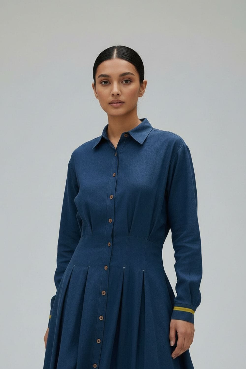 Midnight blue Cecile dress by Doodlage, showcasing a stylish, elegant dress with a fitted silhouette and subtle detailing.