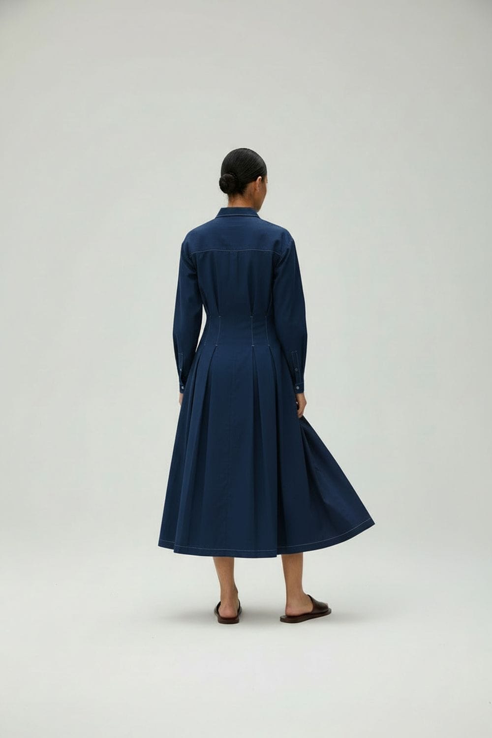 Midnight blue Cecile dress by Doodlage, featuring a stylish, elegant dress with a fitted silhouette and subtle detailing.