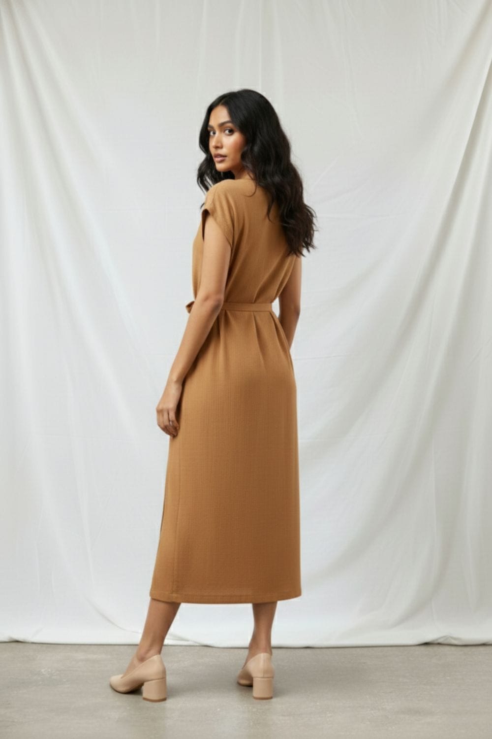 Beige Erna dress by Doodlage featuring a flowy silhouette, soft fabric, and stylish design perfect for casual or semi-formal wear.