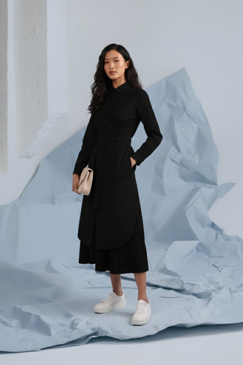 Black Thea shirt dress by Doodlage, shown on a hanger with a collar and button-down front, casual and stylish for everyday wear.