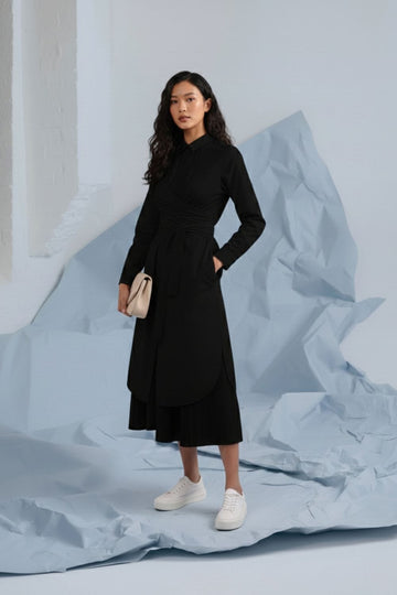 Black Thea shirt dress by Doodlage, shown on a hanger with a collar and button-down front, casual and stylish for everyday wear.