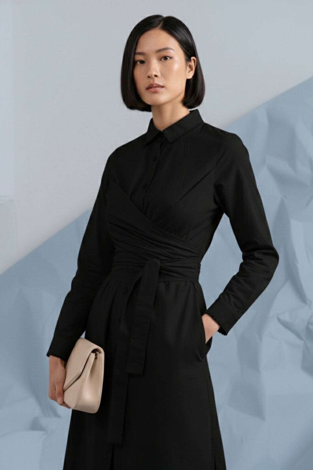 Black Thea shirt dress by Doodlage, featuring a classic collar, button-down front, and long sleeves, shown on a model.
