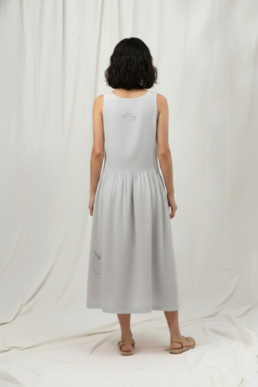 Susan grey dress by Doodlage, showcasing a stylish, knee-length dress with a relaxed fit and subtle textured fabric.