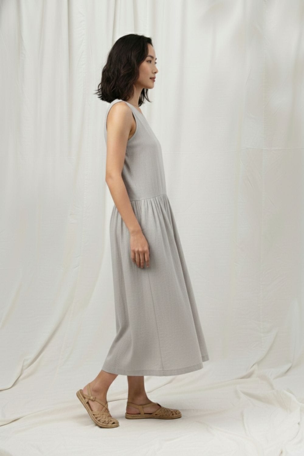 Susan grey dress by Doodlage, showcasing a stylish, casual dress with a relaxed fit and subtle textured fabric.