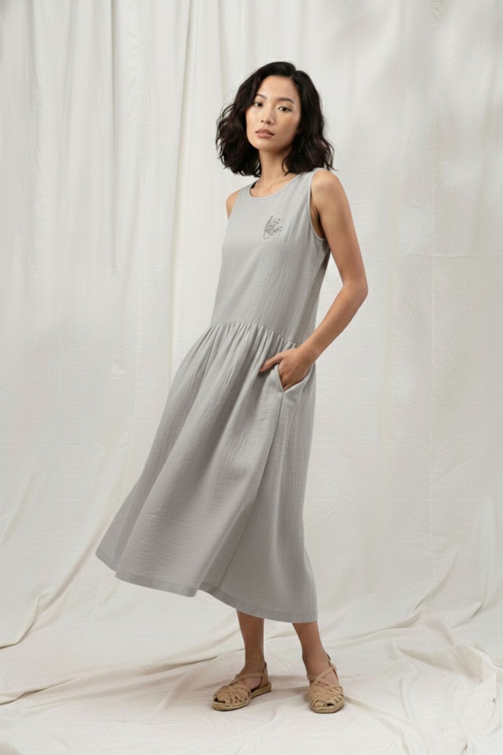 Susan grey Doodlage dress featuring a stylish, comfortable design with a relaxed fit and elegant detailing.