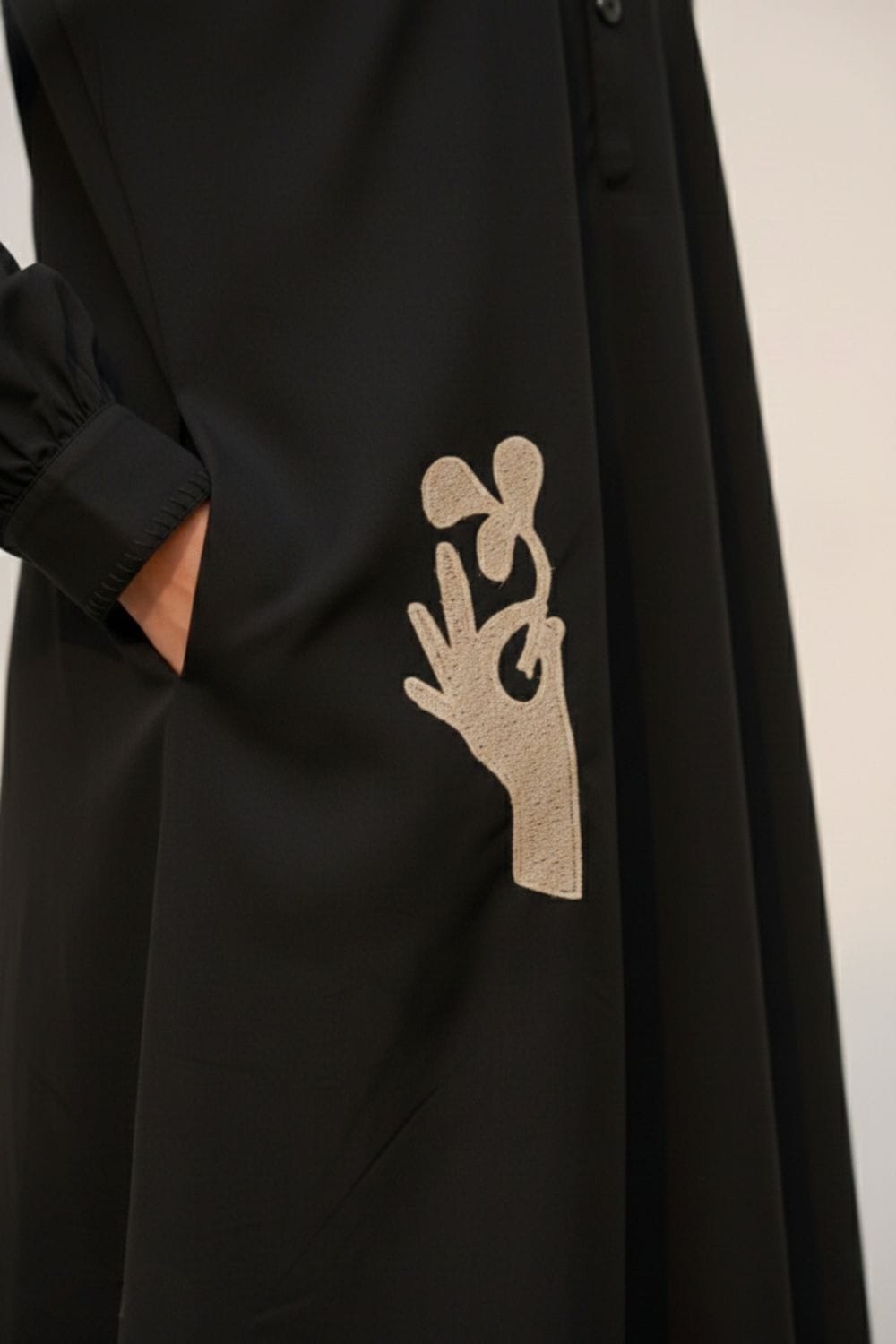 Astrid black dress by Doodlage featuring a stylish, tailored design with long sleeves and a knee-length silhouette.