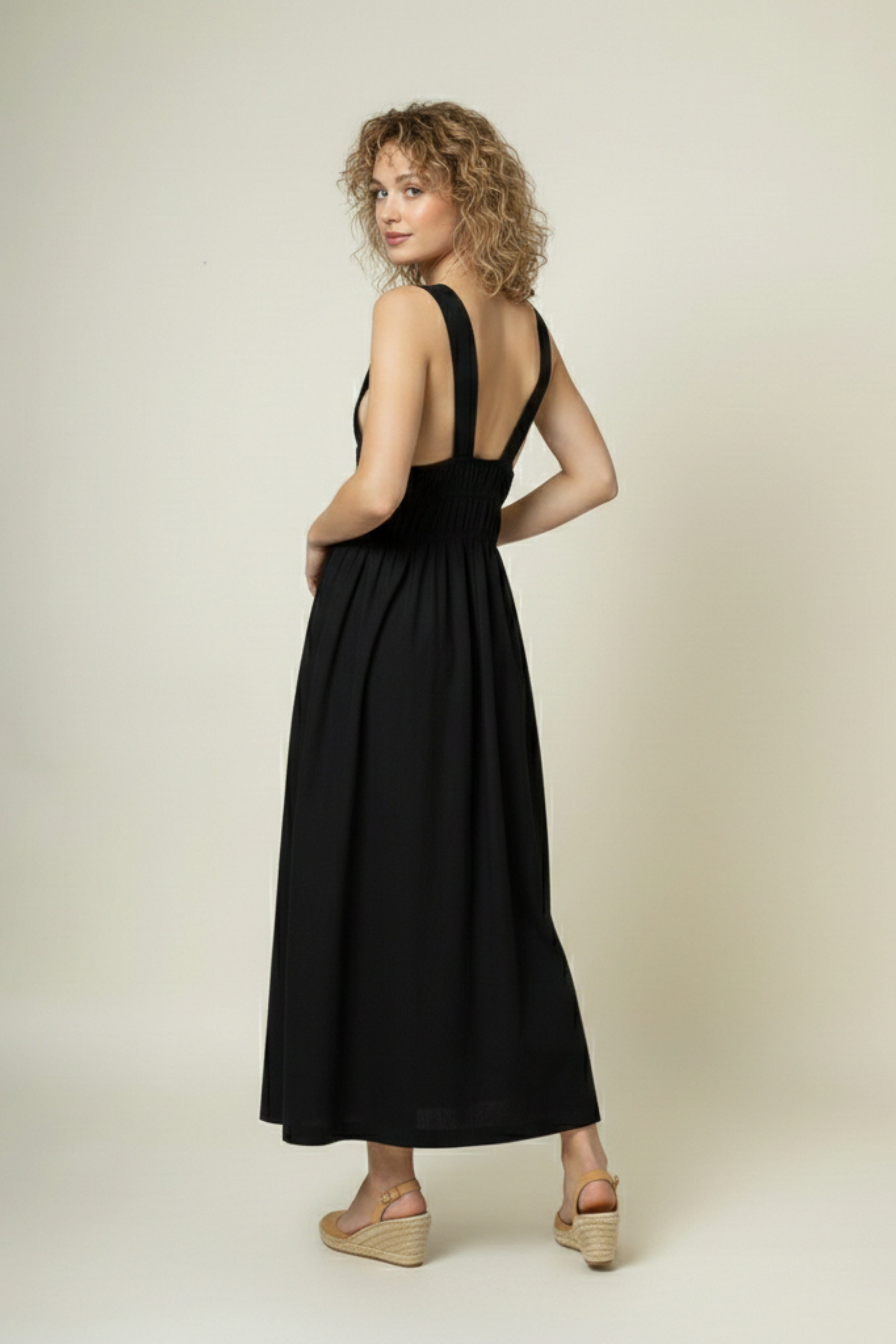 Black Doodlage August dress, stylish and comfortable, featuring a fitted silhouette and elegant design, shown on a model.