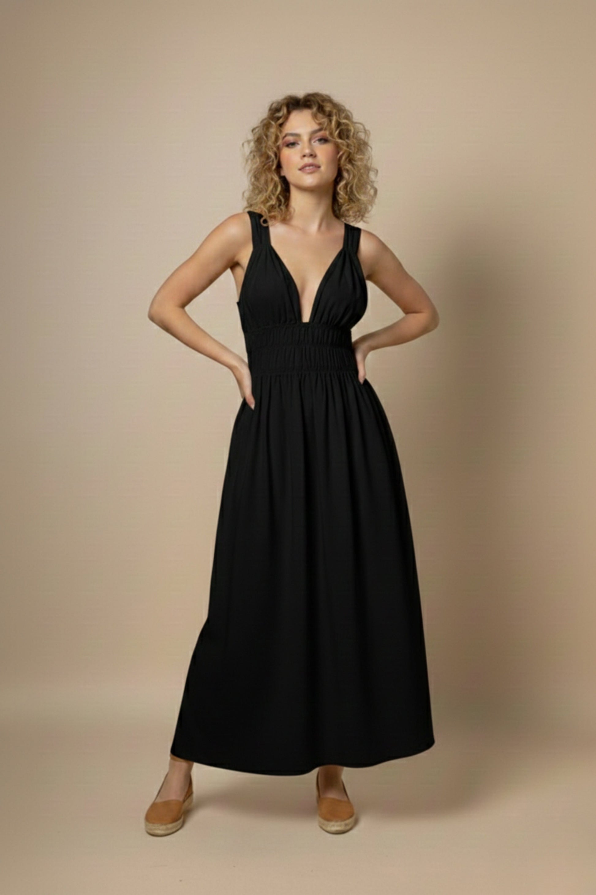 Black Doodlage August dress with a stylish fit and elegant design, shown on a model in a well-lit setting.