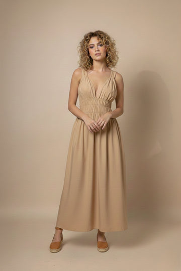 Beige Doodlage dress with a relaxed fit, featuring subtle stitching and a soft, comfortable fabric for casual wear.