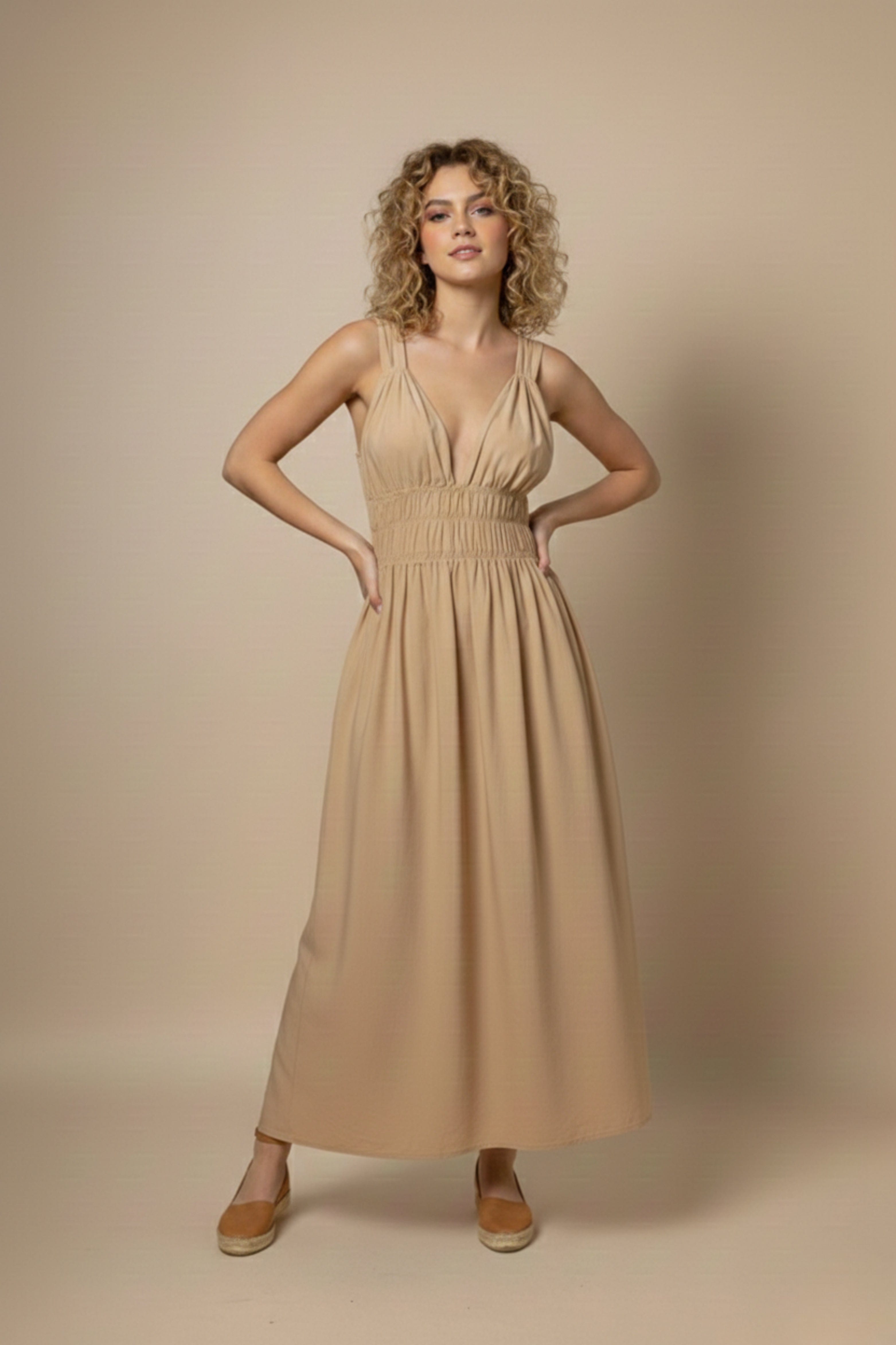 Doodlage August beige dress, lightweight and stylish, shown on a hanger with fabric details and neutral background.