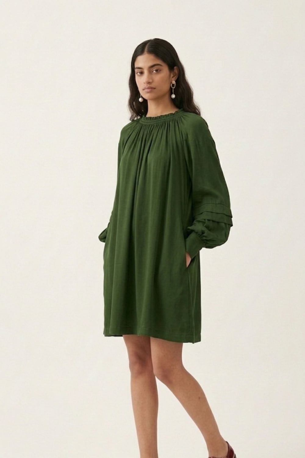 Doodlage Alice olive dress featuring a stylish, knee-length design with a relaxed fit and subtle detailing.