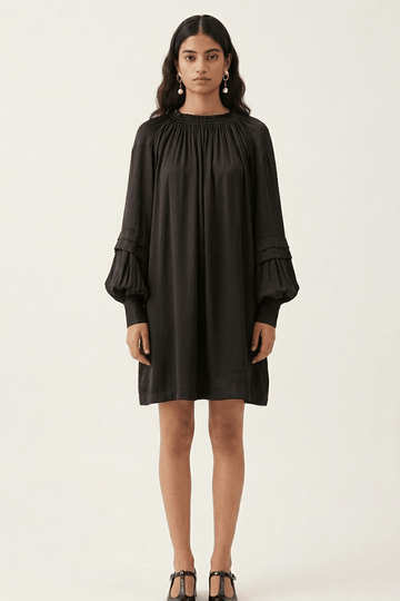 Black Alice dress by Doodlage featuring a stylish, fitted design with subtle detailing, perfect for casual or semi-formal wear.